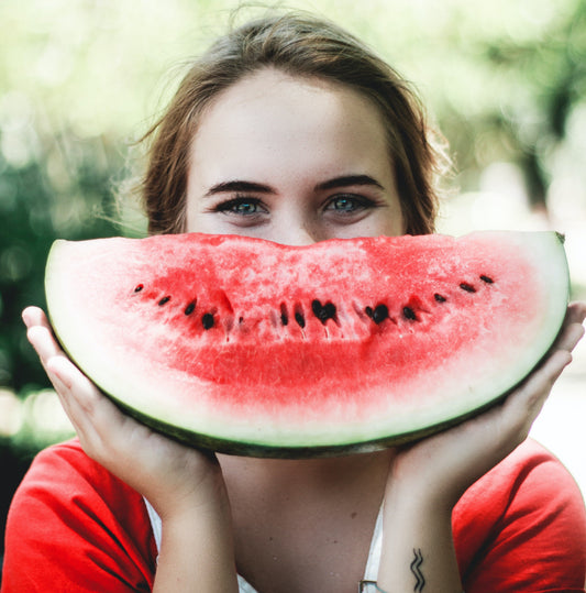 Happy person with a watermelon